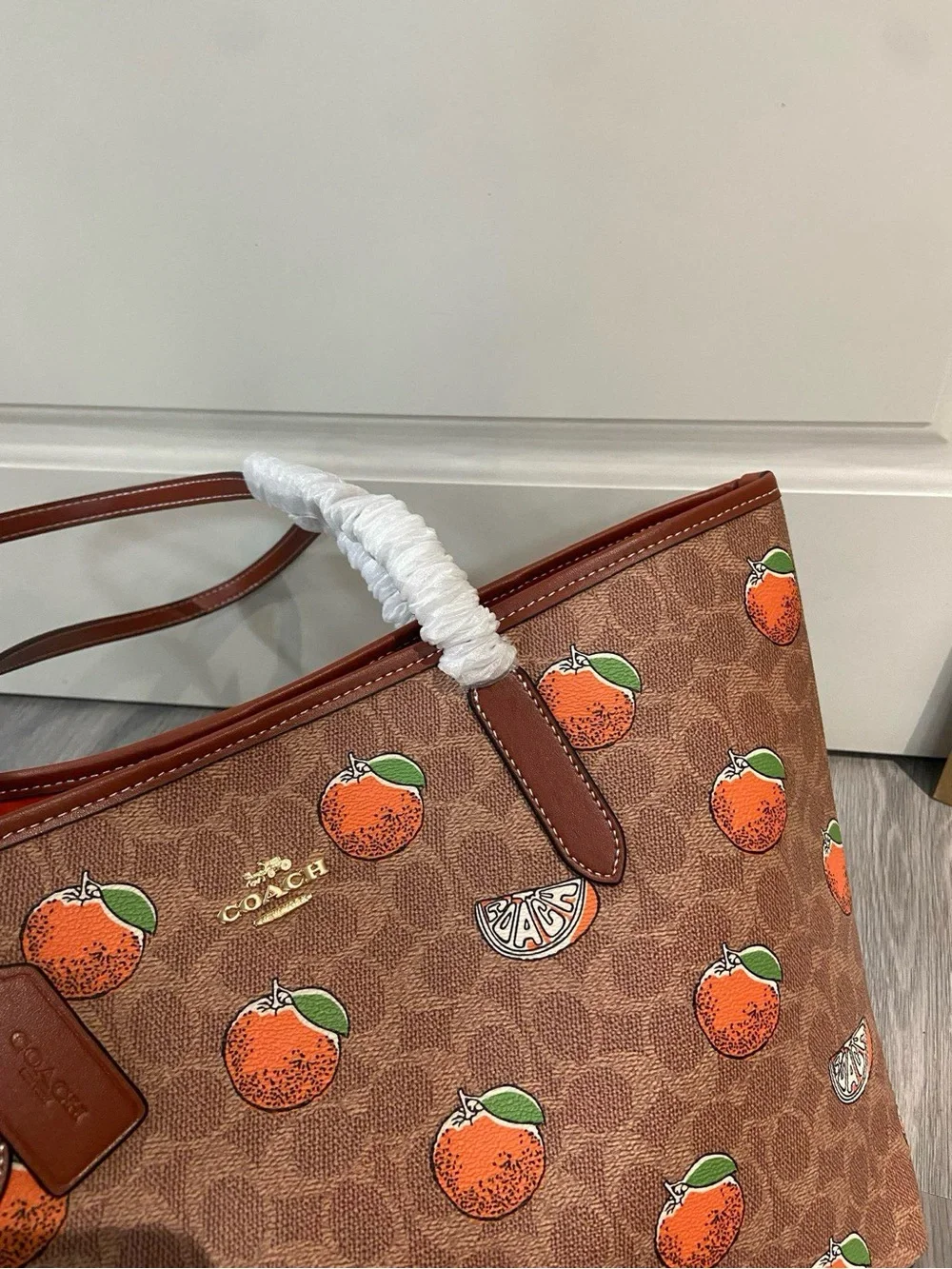 Coach Brown Canvas Tote with Orange Fruit Print